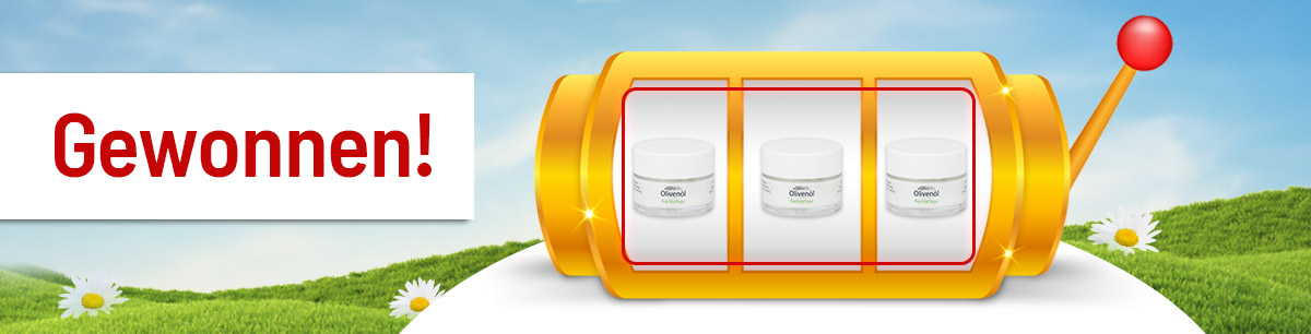 Schriftzug „Gewonnen!“ neben goldener Slotmaschine mit drei Olivenöl-Creme Tiegeln vor Wiesen- und Blumenhintergrund