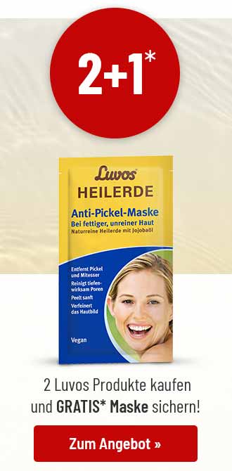 Luvos Heilerde Anti-Pickel-Maske vor beigem Hintergrund. Darüber ein roter Kreis mit der weißen Aufschrift „2+1*“, darunter ein roter Button mit Text.