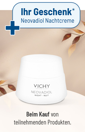 Vichy Neovadiol Nachtcreme als Geschenk beim Kauf teilnehmender Produkte. Der weiße Cremetiegel steht vor einem beigen Hintergrund mit herbstlichen Blättern und Geschenkhinweis im oberen Bereich.
